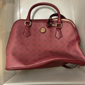 Red Leather Satchel with Structured Design and Gold Hardware